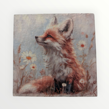 A furry fox sitting among daisies with a serene expression.